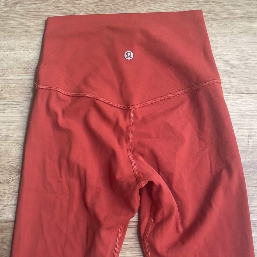 LULULEMON Capri style burnt orange leggings. size 2
